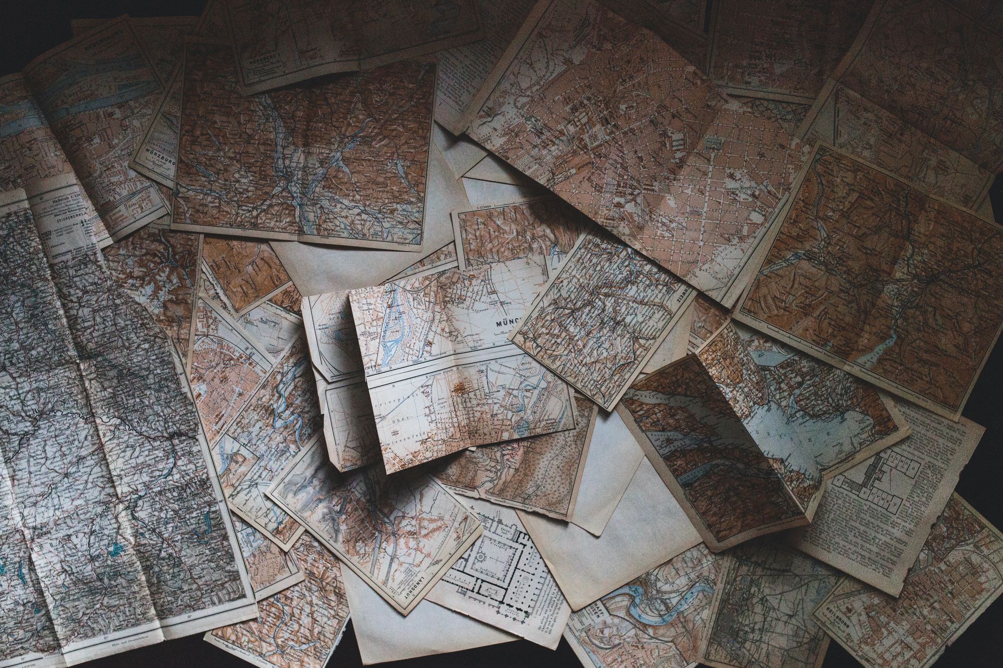 A picture of a pile of old maps